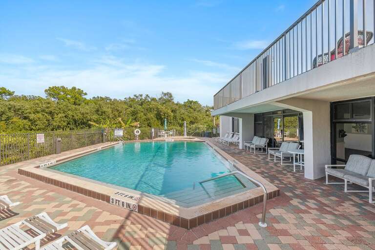 Enjoy your beach stay with access to this sunny poolside oasis, complete with comfortable lounge