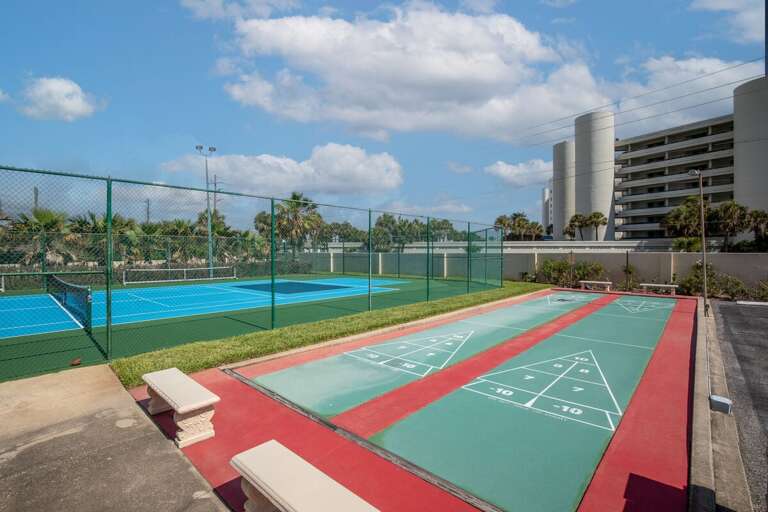Enjoy resort-style amenities with on-site tennis and shuffleboard courts just moments from the ocean. Perfect for an active beach stay filled with outdoor fun, relaxation, and coastal sunshine.