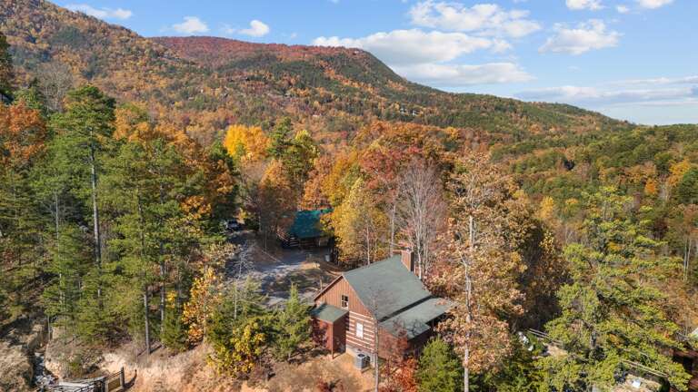 Unwind on the private deck and take in sweeping Smoky Mountain views — pure peace at Dancing Embers.