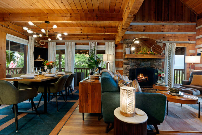 Fireplace glow meets open-concept living — gather the whole crew in this bright, modern great room at Dancing Embers.