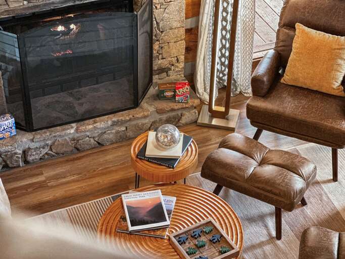 Game night, mountain style — unwind with classics like Yahtzee, UNO, and National Parks trivia in your cozy cabin retreat.