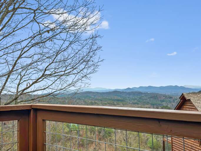 Enjoy quiet moments overlooking layers of mountain ridges—perfect for morning coffee or sunset unwinding.