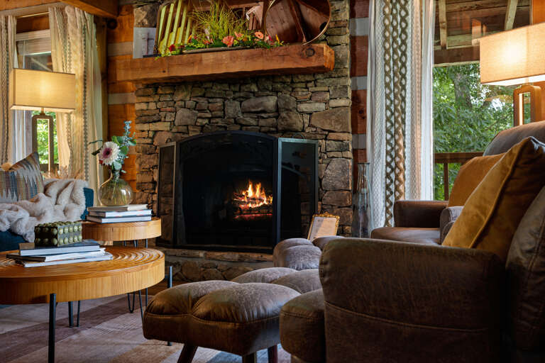 There's nothing like fireside evenings in the mountains — this warm, stylish corner of Dancing Embers was made for unwinding.