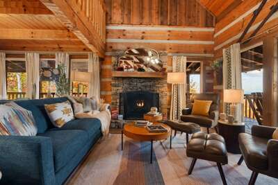 Settle into mountain comfort — plush seating, warm wood interiors, and cozy cabin charm made for slow mornings and long conversations.