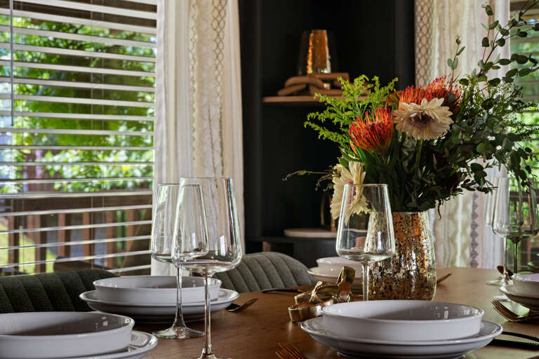 Fine glassware, and modern style — every detail invites you to slow down and savor evenings at Dancing Embers.
