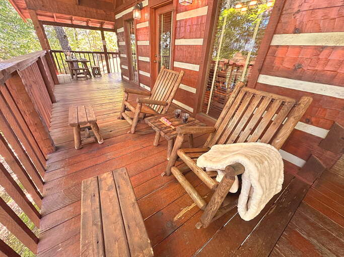 Unwind on the rocking chairs with a blanket and your favorite drink — the perfect Smoky Mountain retreat moment.