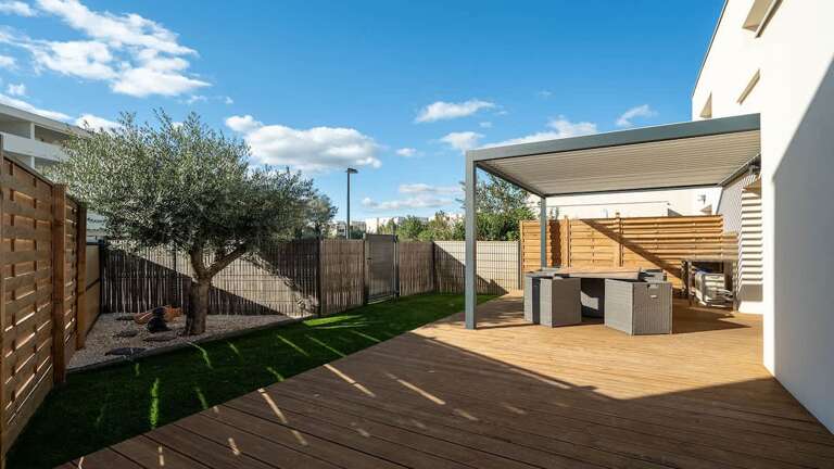 Sunny Deck With Pergola, Fenced Yard, And Olive Tree