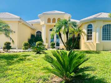 Waterfront Luxury with Screened Infinity-Style Pool &amp; Southern Exposure