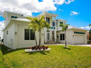 Riverfront Designer Masterpiece Ultra-Luxury Villa with Infinity Pool &amp; Private Yacht Dock