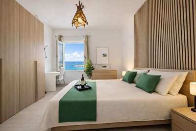 Beachfront Apartment with Pool & Free Parking