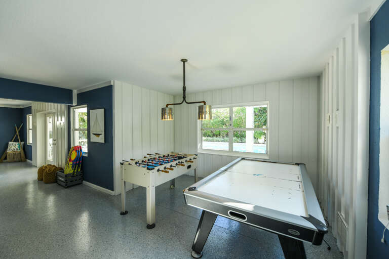 Game room- Foosball, ping pong, and pool table