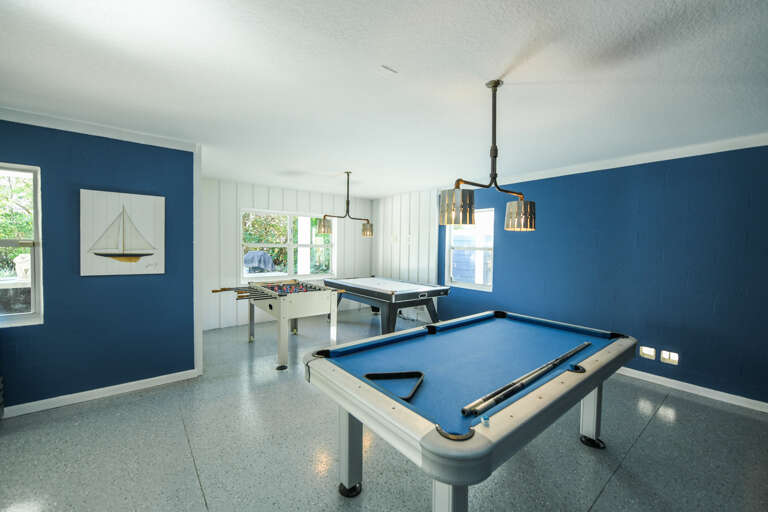 Game room- Foosball, ping pong, and pool table