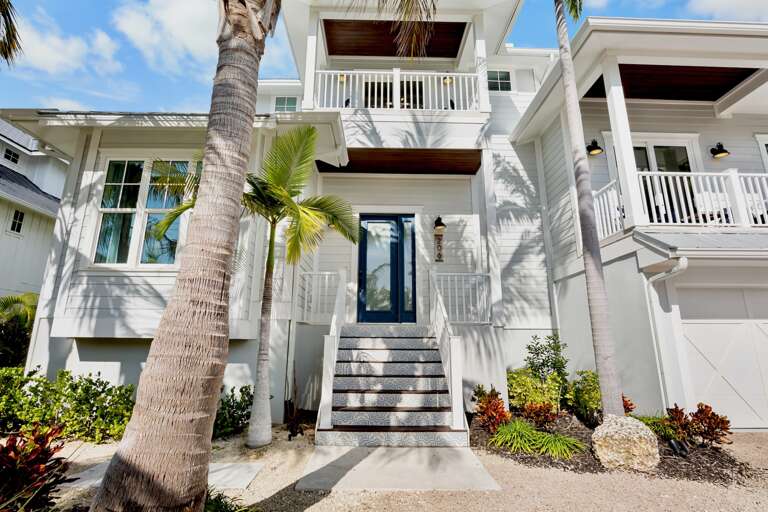 Home exterior with tropical landscaping