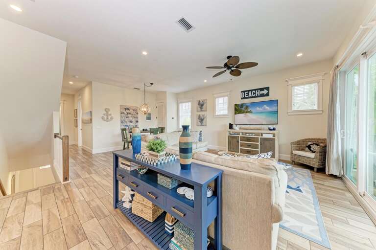 Living Room with TV and Balcony Access