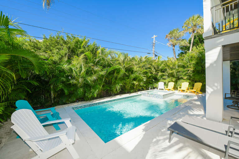 Pool area with relaxing loungers