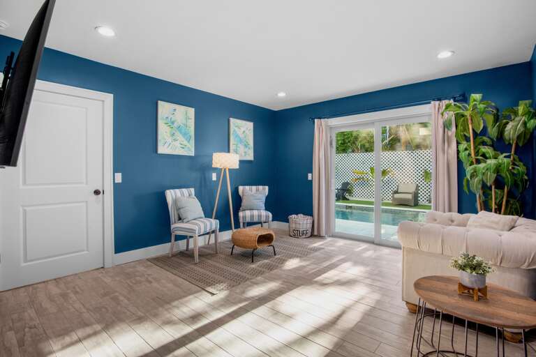 Living area with sliding doors to private pool - 1st floor