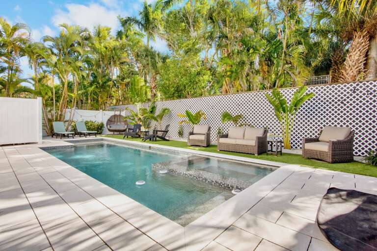 Private pool with in-ground spa and lounge seating