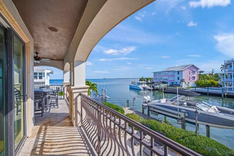 Waterfront balcony with marina and ocean views