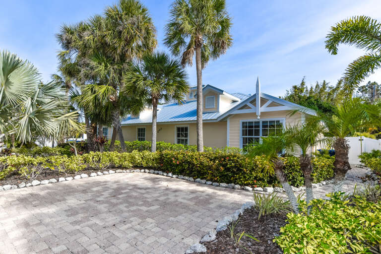 Exterior of Ariel's Island West Unit by AMI Locals