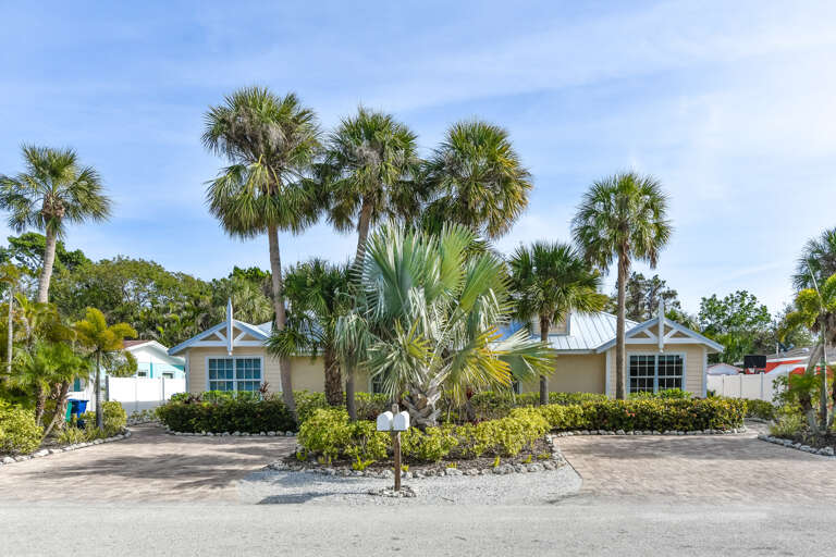 Exterior of Ariel's Island West Unit by AMI Locals