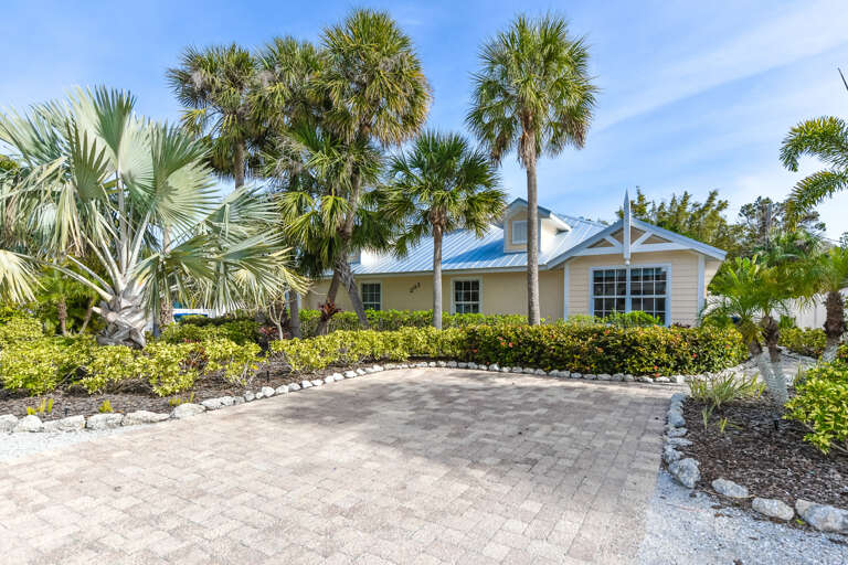 Exterior of Ariel's Island West Unit by AMI Locals