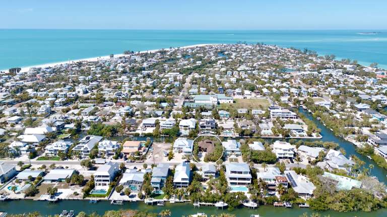 Aerial view of Tamatoa by AMI Locals