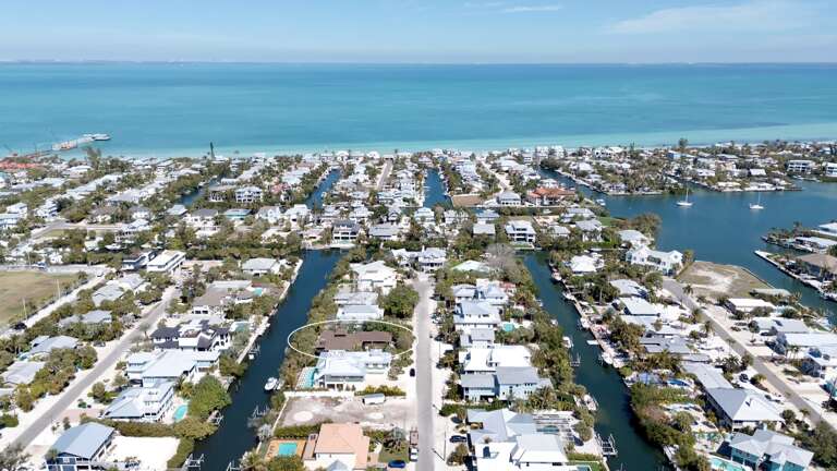 Aerial view of Tamatoa by AMI Locals