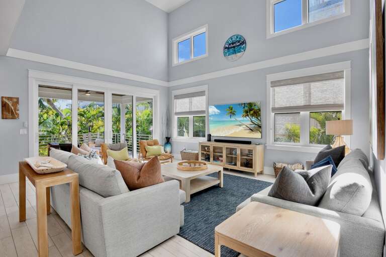 Living area with TV and sliding doors to your private oasis