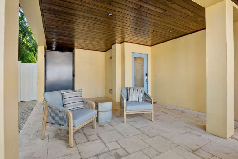 Covered outdoor lounge with comfortable seating