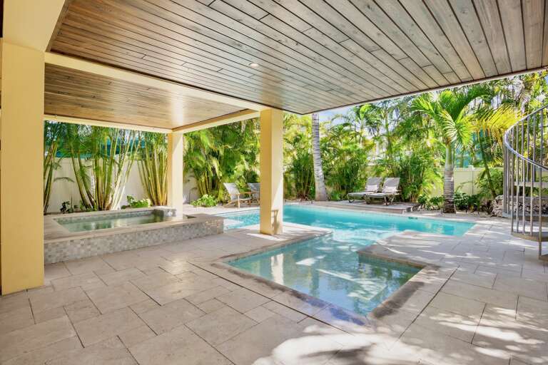 Private tropical with a stunning pool and relaxing spa
