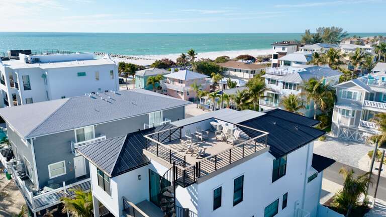 Rooftop deck with seating and views