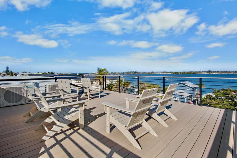 Rooftop deck with seating and views