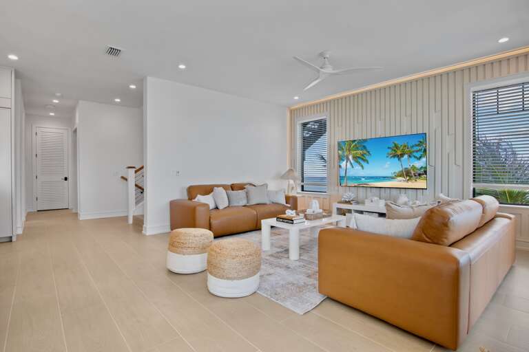 Living area with plush seating and TV