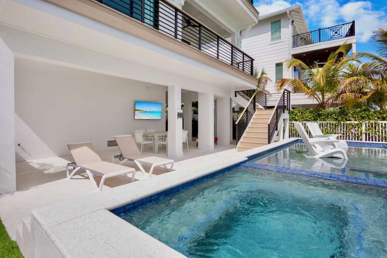 Private pool with covered lounge area