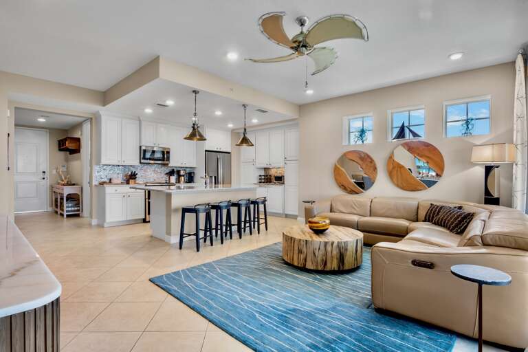 Open-concept kitchen and living area with island seating