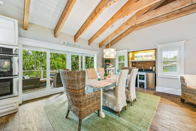 Dining Area with Wet bar and Balcony Access