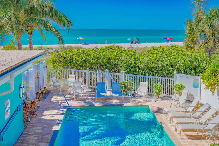Heated Beachfront Community Pool and Loungers