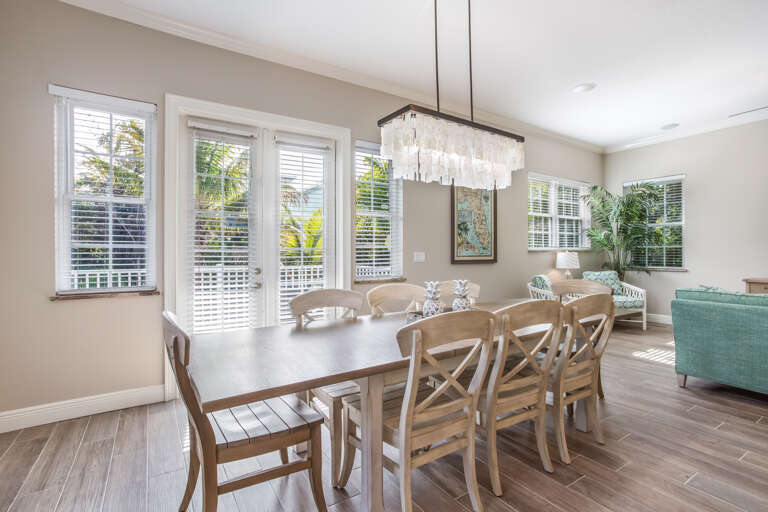 Dining to Main Floor Balcony with Seating