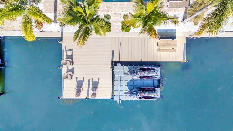 Waterfront property features private dock