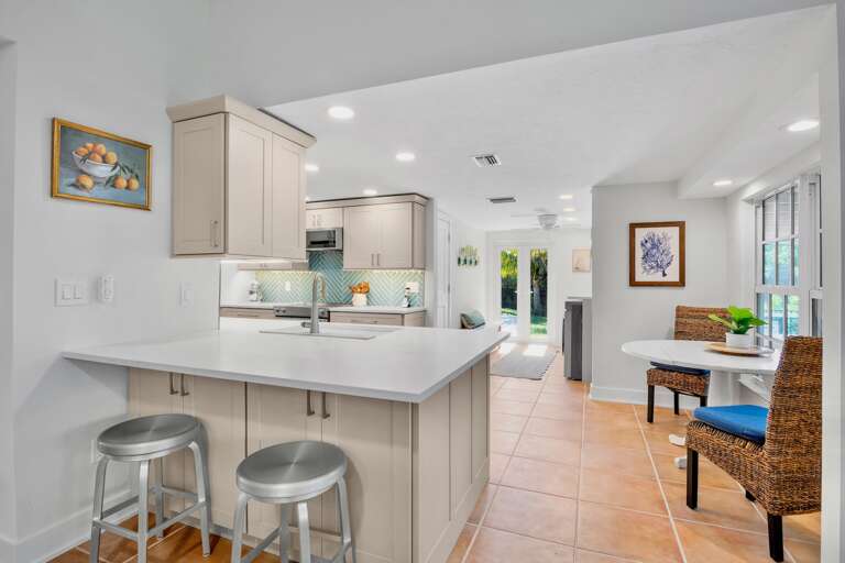 Stylish island with barstools