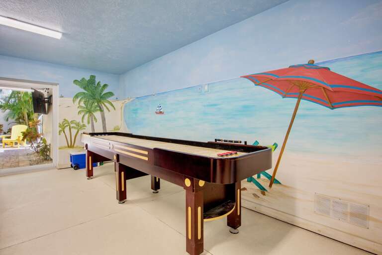 Game Room with Shuffleboard Table