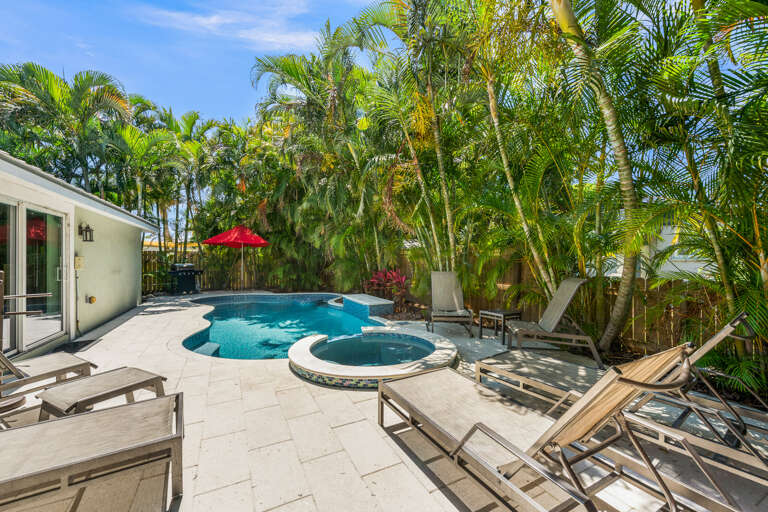 Private pool with sun loungers and BBQ grill