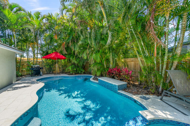 Private pool with spa, sun loungers, and BBQ grill