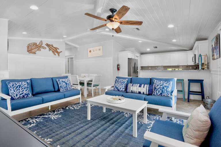 Bright living space with comfortable blue seating