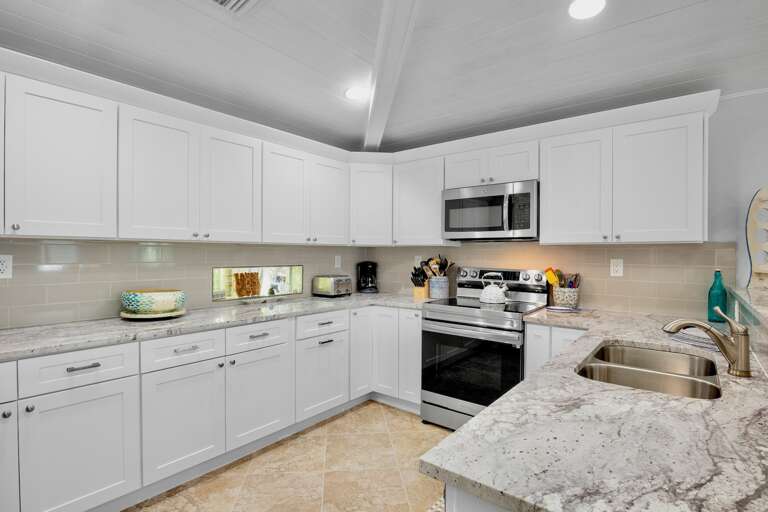 Fully equipped kitchen with ample storage space