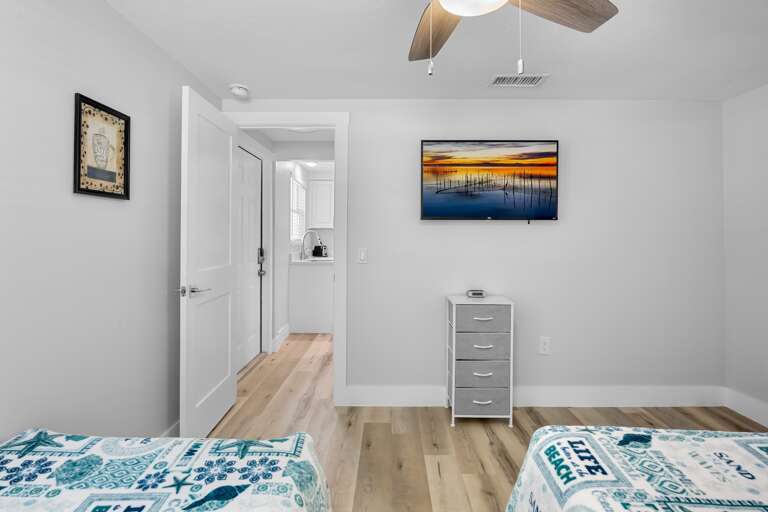 Second bedroom with two twin beds.