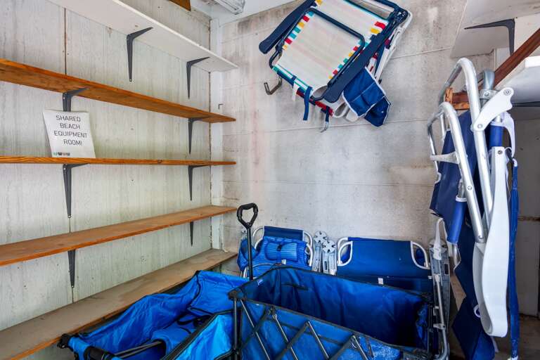 Beach chairs and supplies available for guests to enjoy.