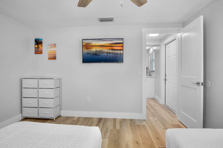 Second bedroom with two twin beds.
