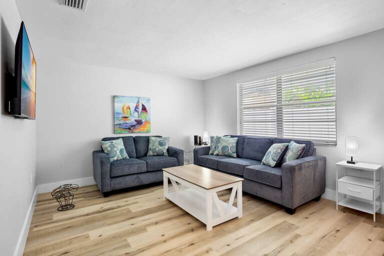 Bright and comfortable living room with plenty of space to relax.