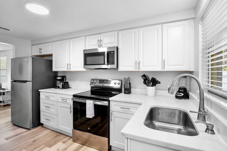 Fully equipped kitchen for preparing meals during your stay.